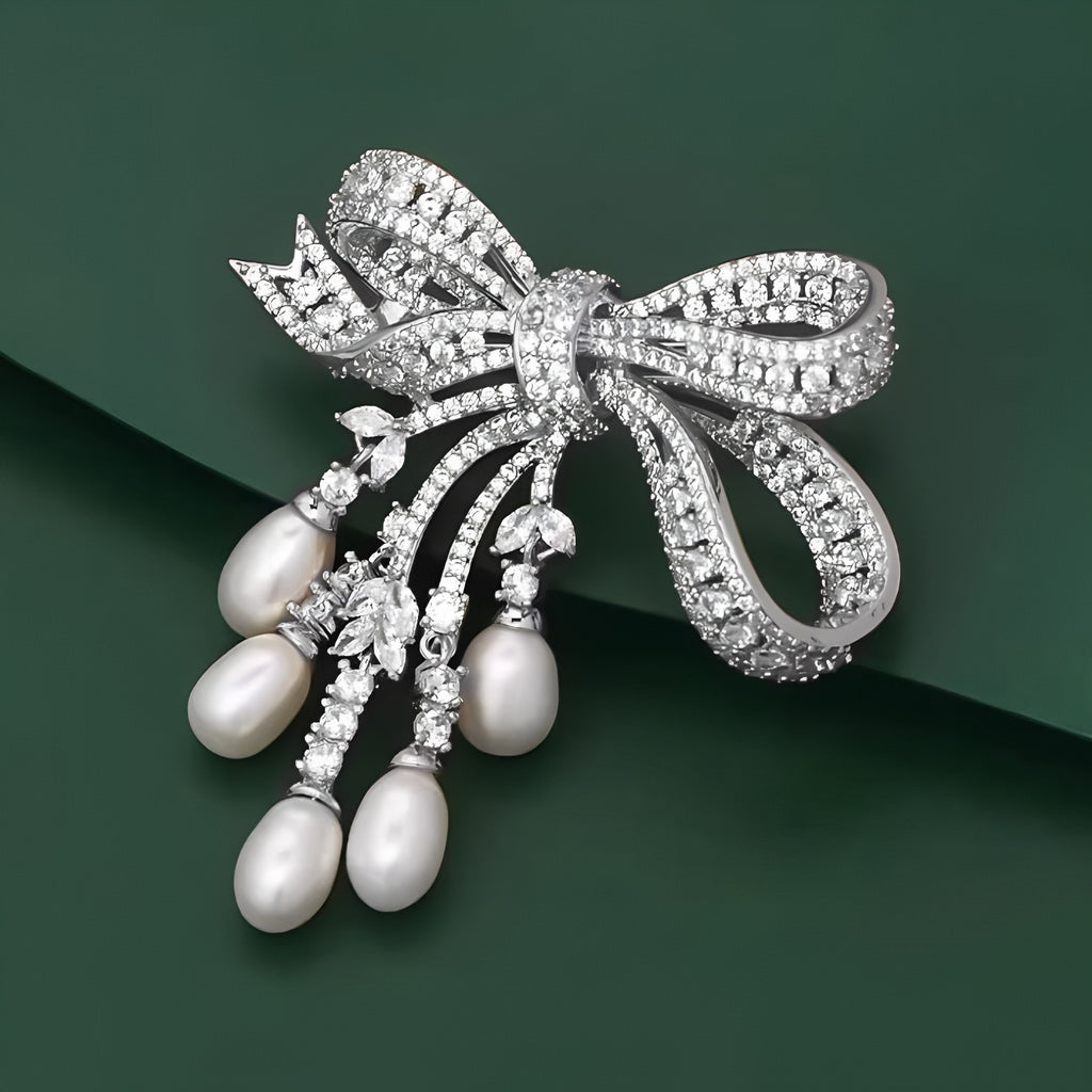 Broche de borla de arco