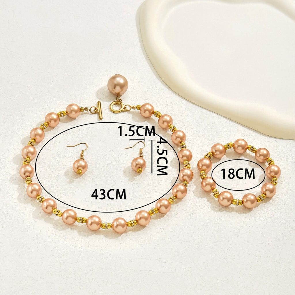 Vintage pearl necklace; elegant earrings; beaded bracelet set.