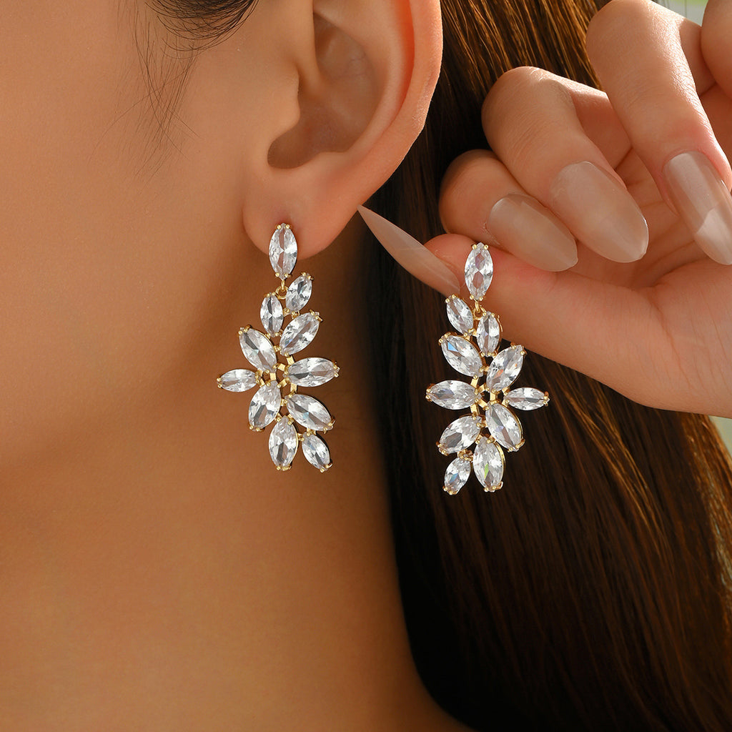 Chanel-style women's earrings encrusted with diamonds