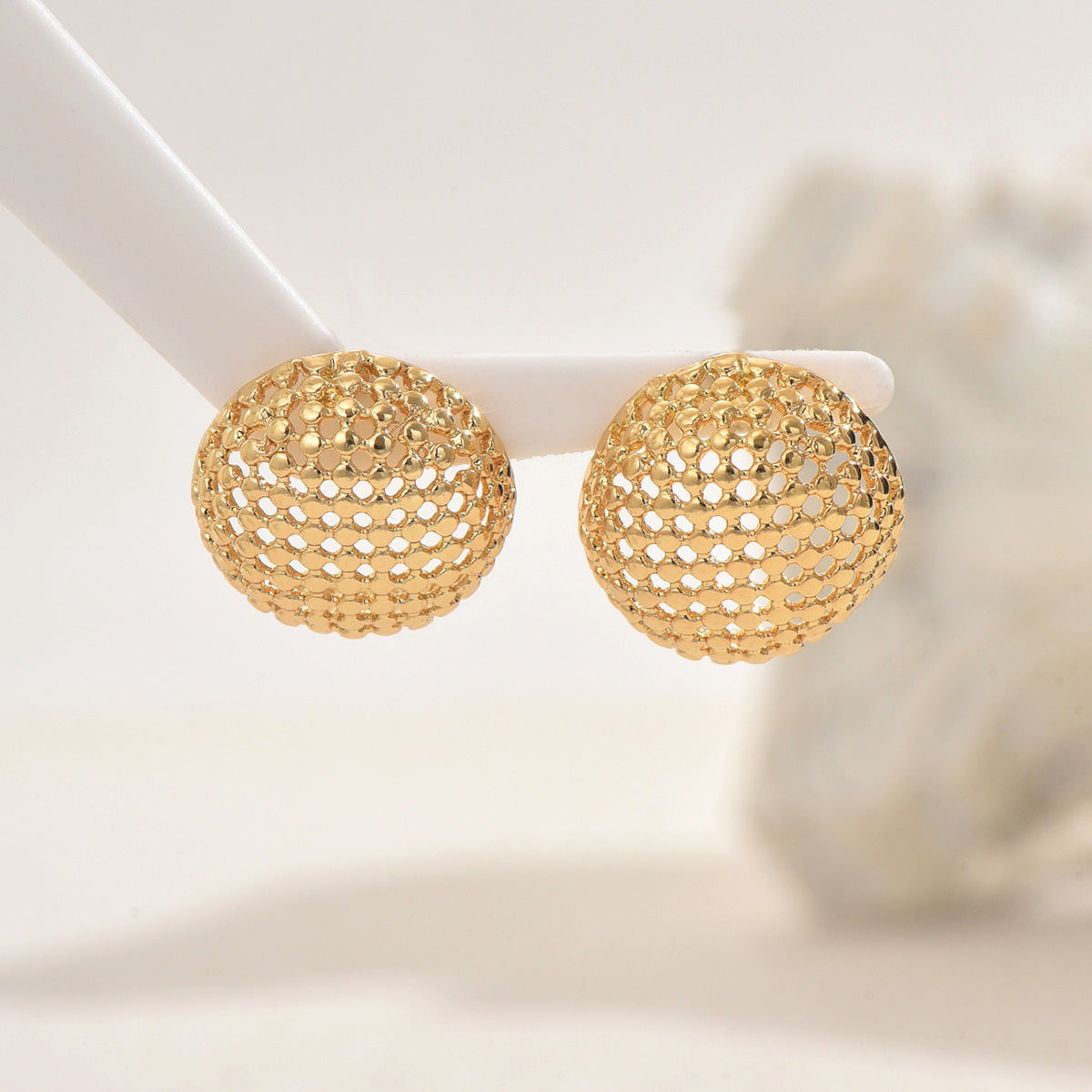 Geometric hollow high-end light luxury earrings