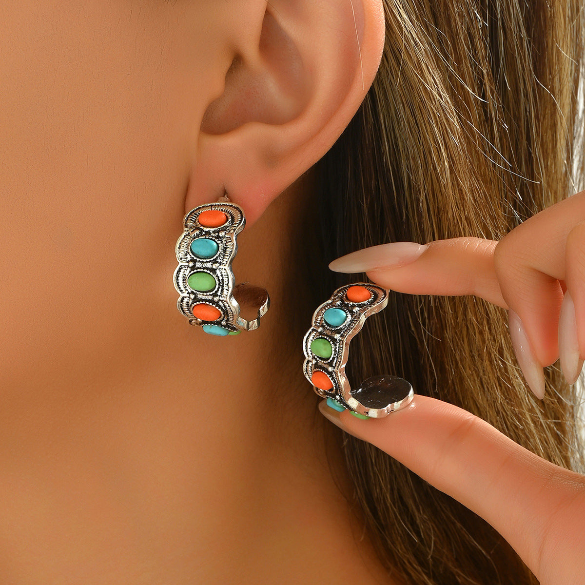 Creative C-shaped earrings made of colored natural gemstones