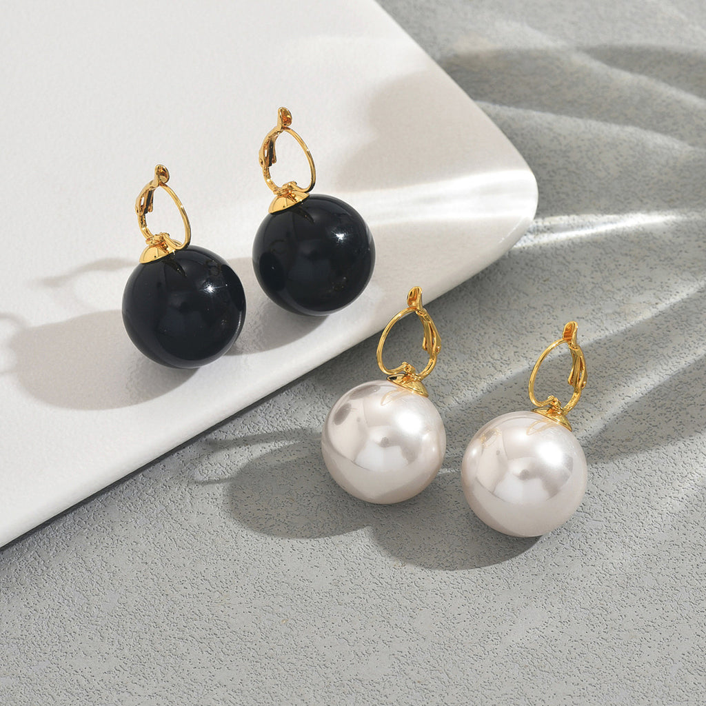 Simple pearl-set earrings