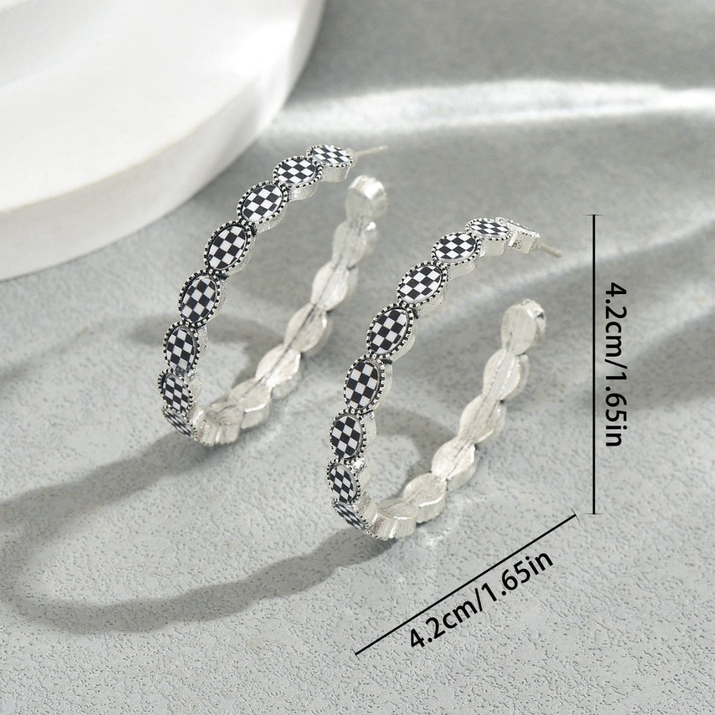 Vintage-style gemstone-encrusted C-shaped earrings