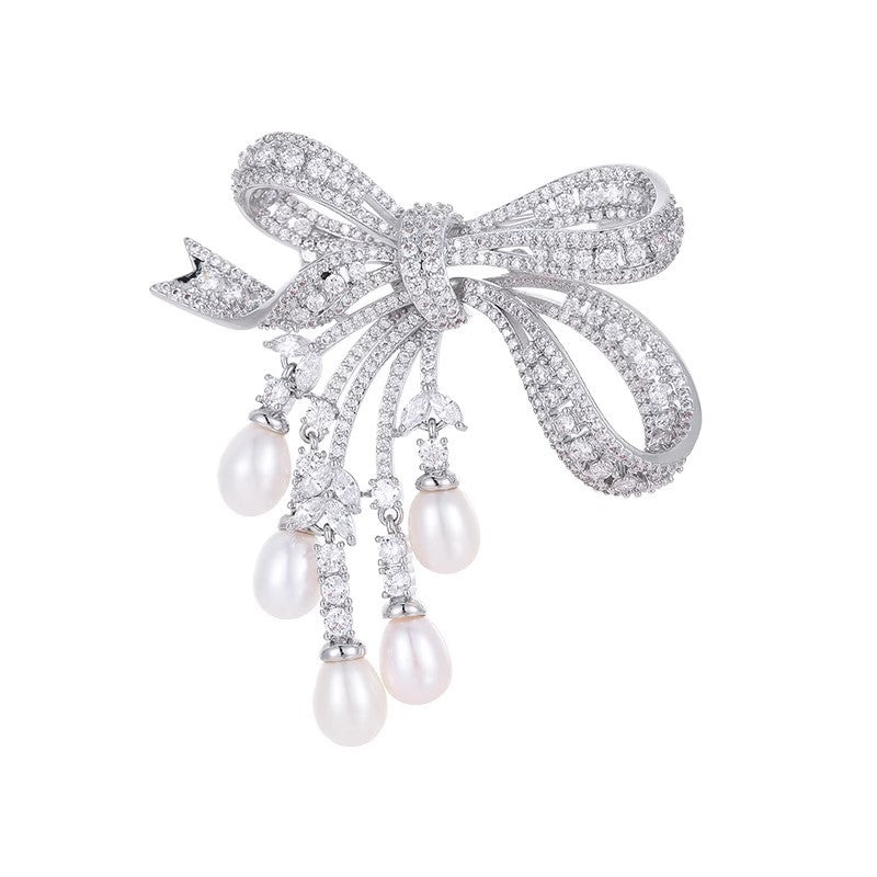 Broche de borla de arco