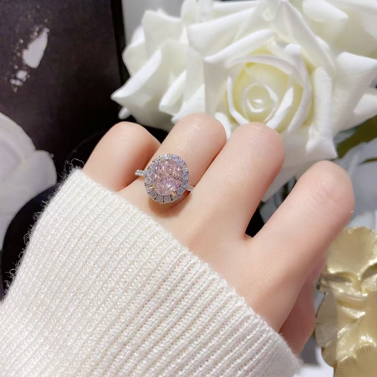 Pink diamond pigeon egg oval ring