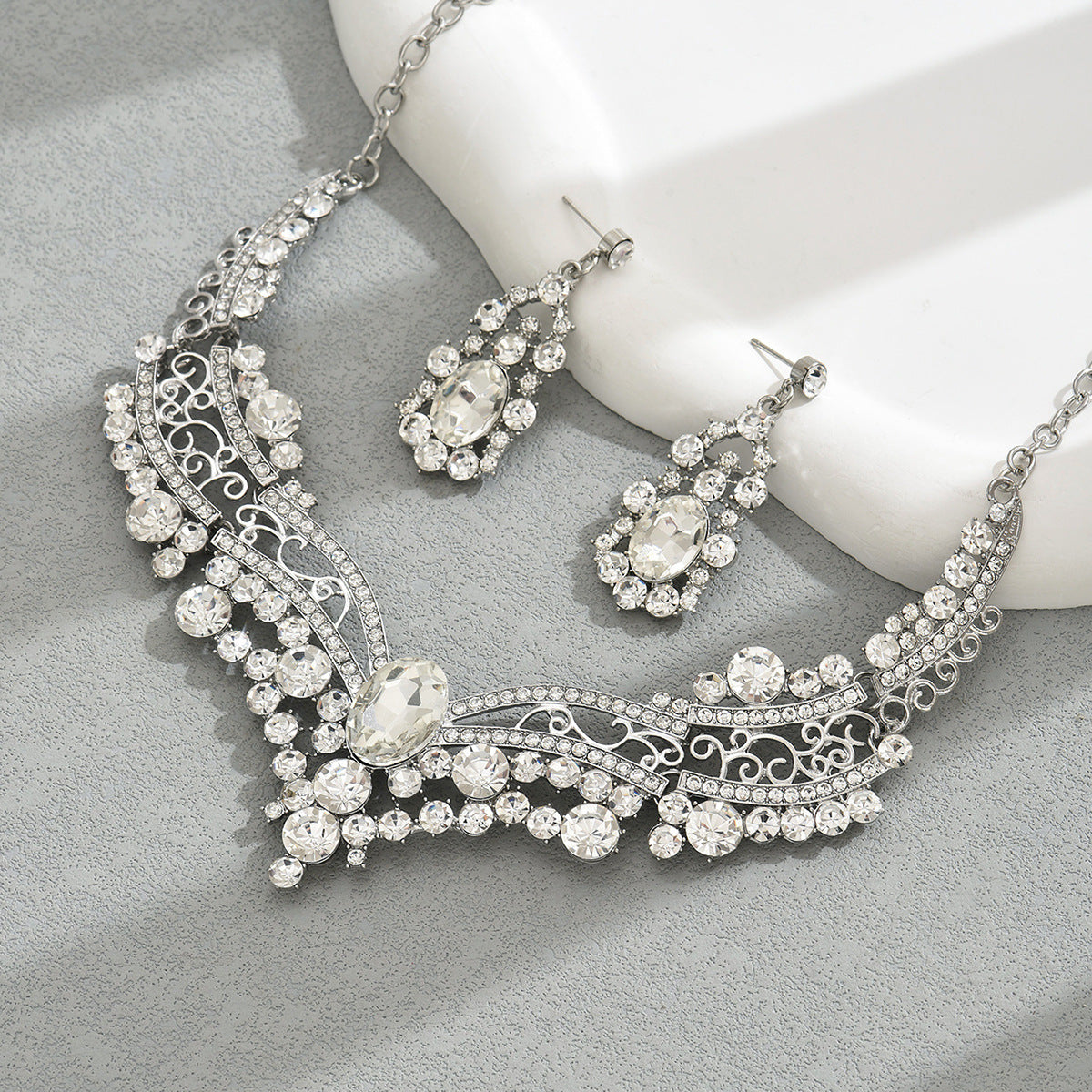 Niche diamond-encrusted necklace and earring sets.