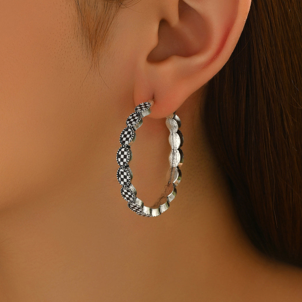 Vintage-style gemstone-encrusted C-shaped earrings