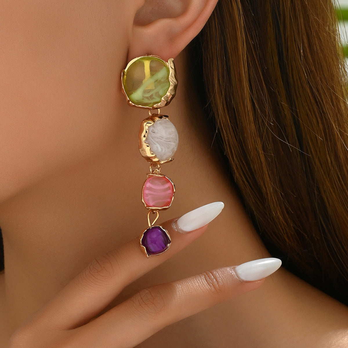 Forest-themed high-end earrings inlaid with gemstones