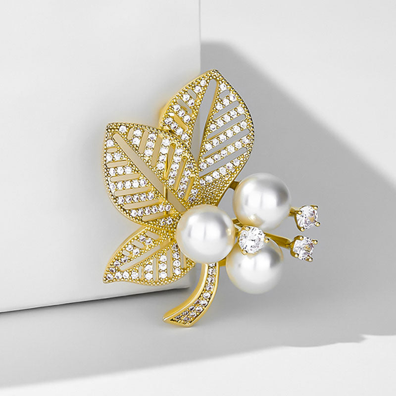 Broche te t-xaq ex te perla