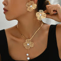 Flower and pearl necklace and earring set