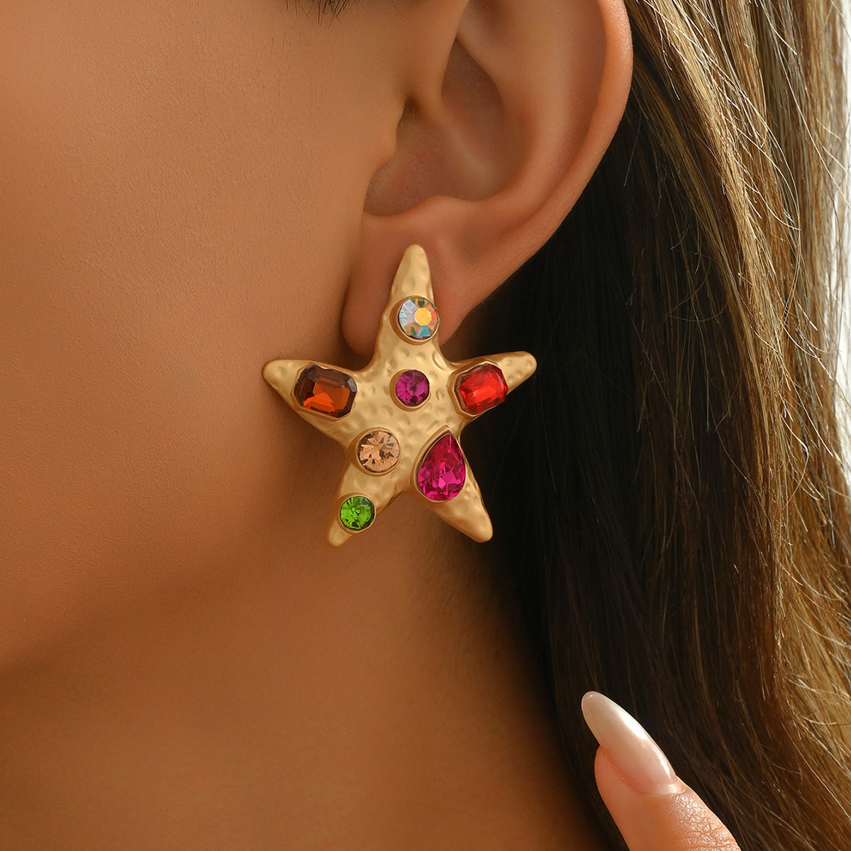 Star-shaped colored diamond earrings