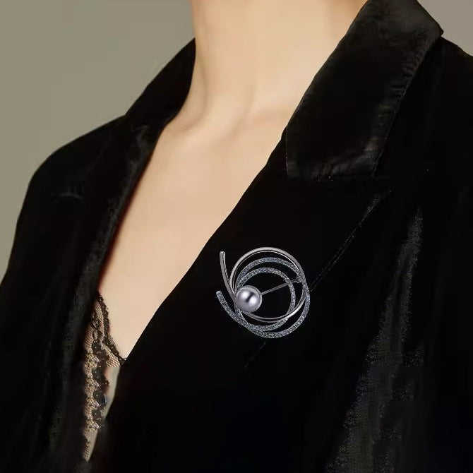 Broche de diamante en forma de anillo