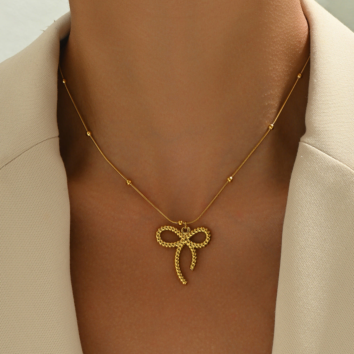 Chanel bow necklace