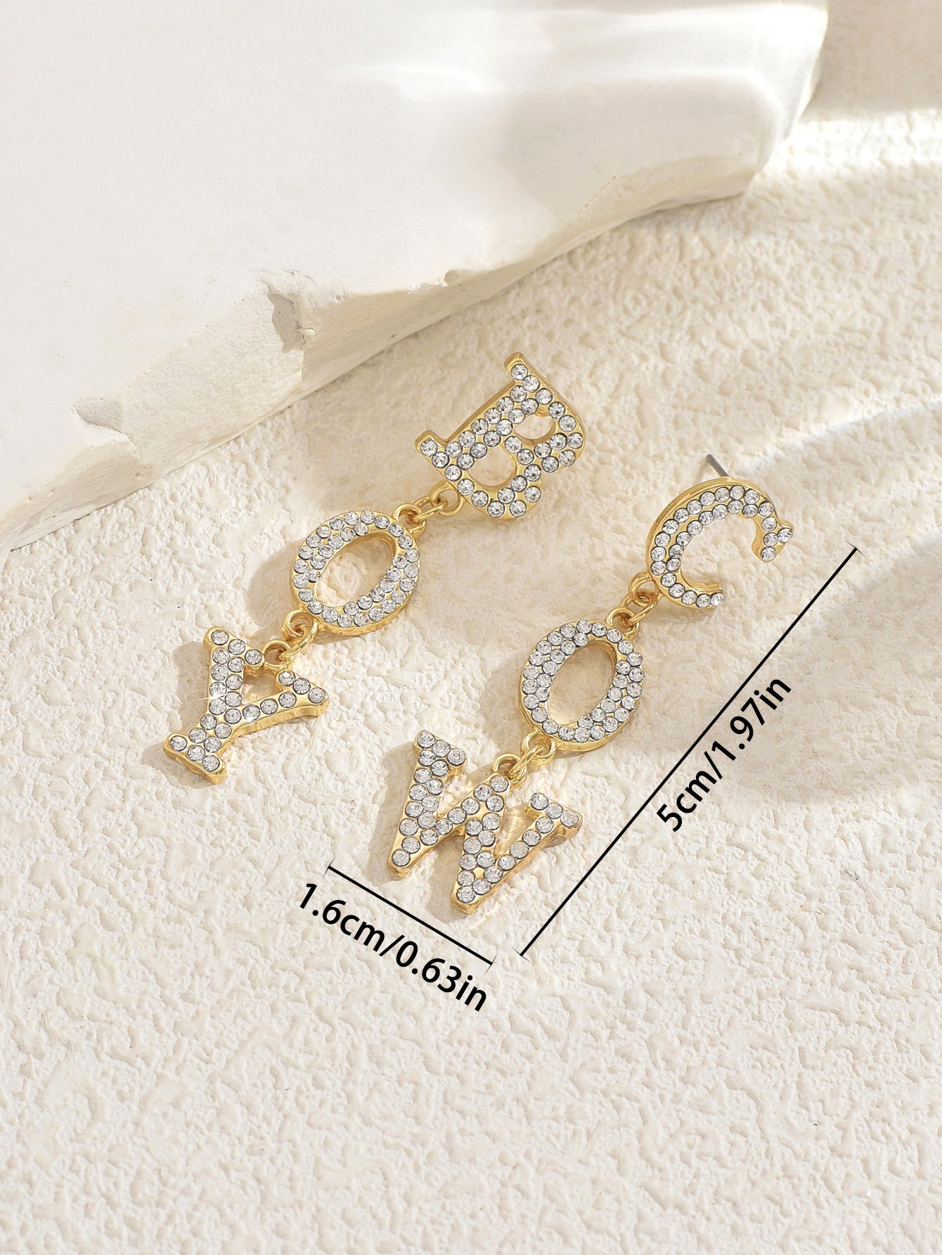 Geometric letter diamond earrings