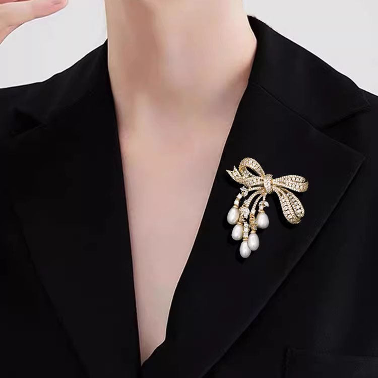 Broche de borla de arco