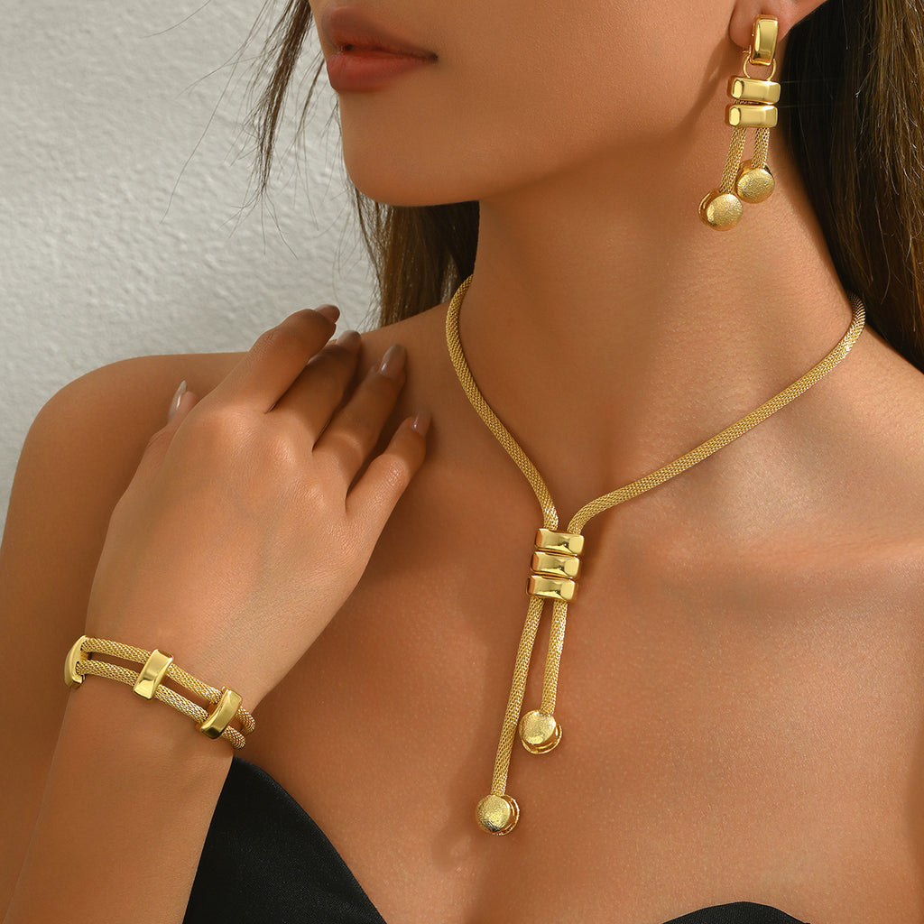 18K necklace, tassel earrings, and versatile bracelet jewelry set
