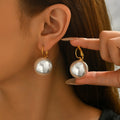 Simple pearl-set earrings