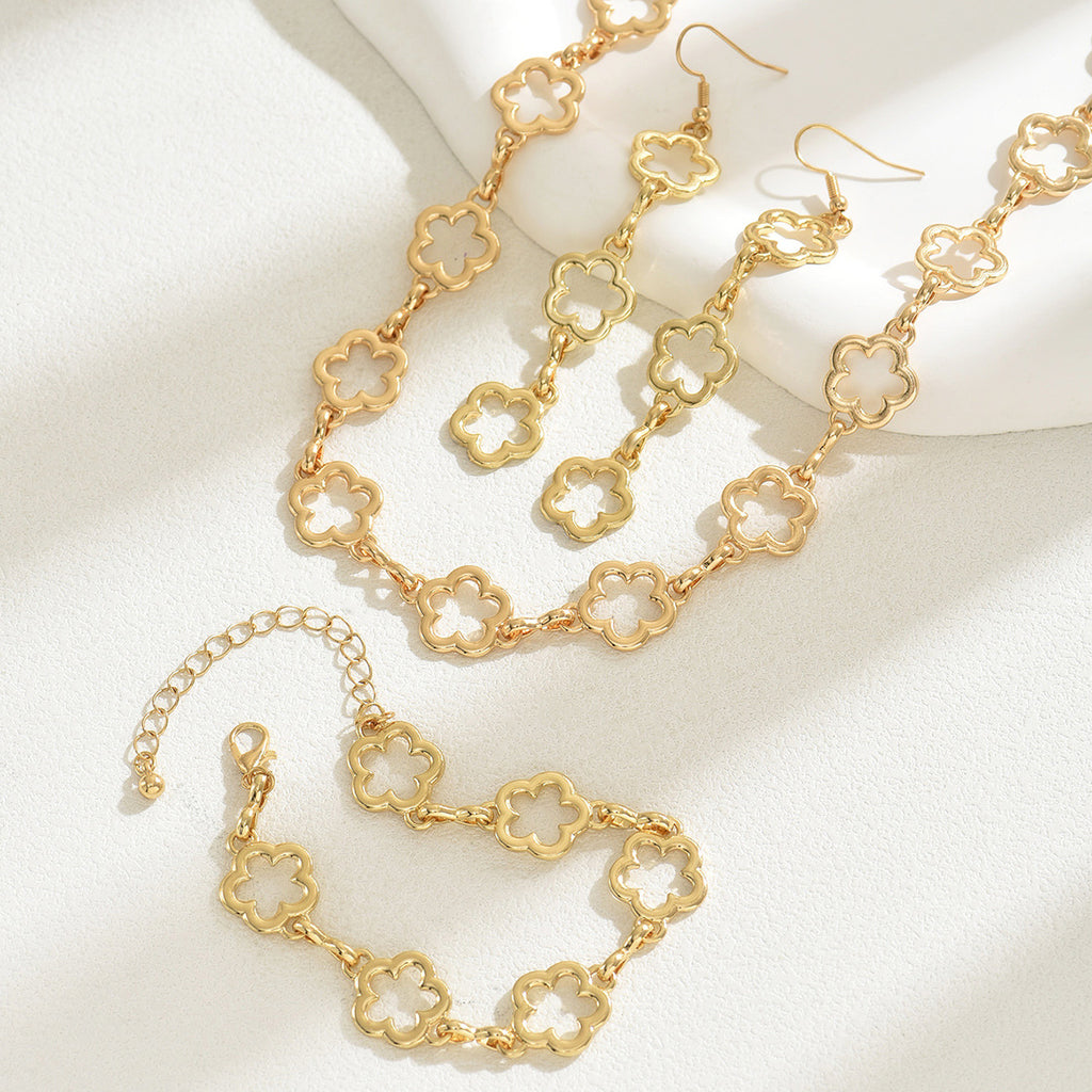 Plum blossom necklace, paired with tassel earrings and a bracelet set.