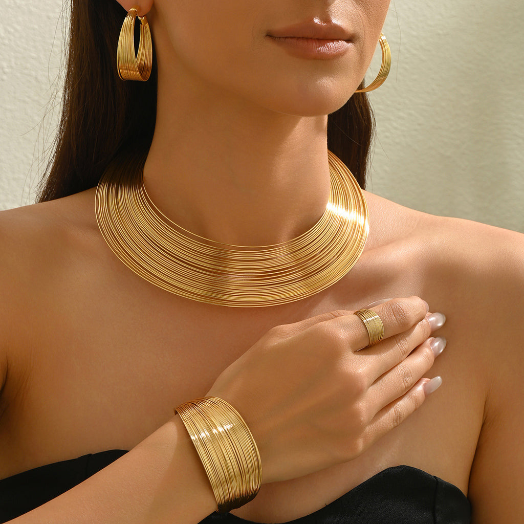 Multi-layered metal jewelry set, adjustable bracelet