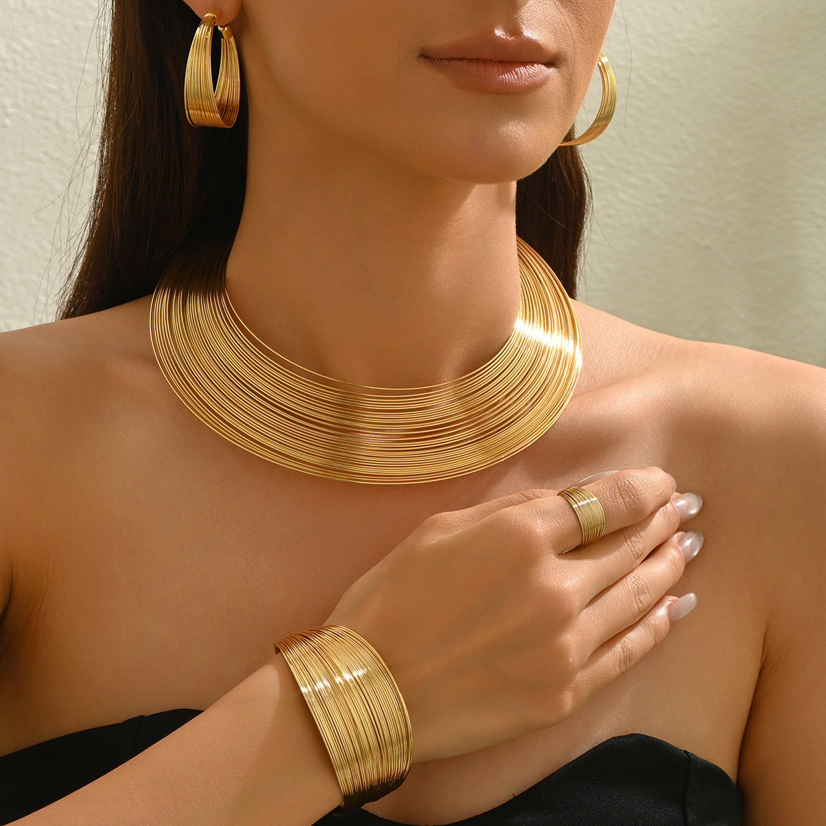 Multi-layered metal jewelry set, adjustable bracelet