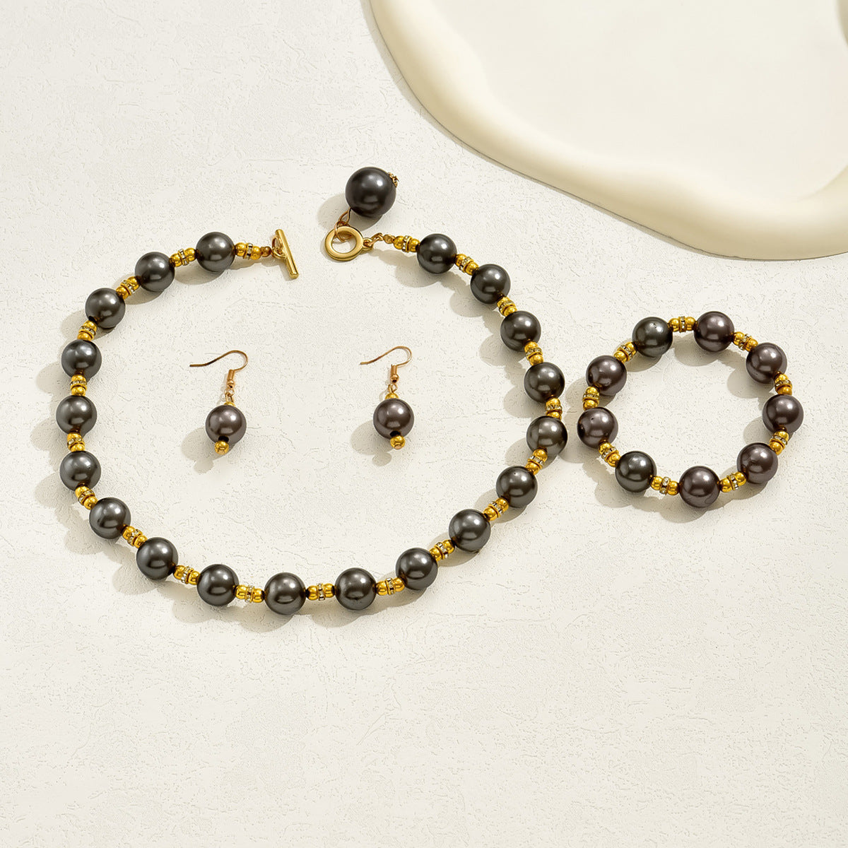 Vintage pearl necklace; elegant earrings; beaded bracelet set.