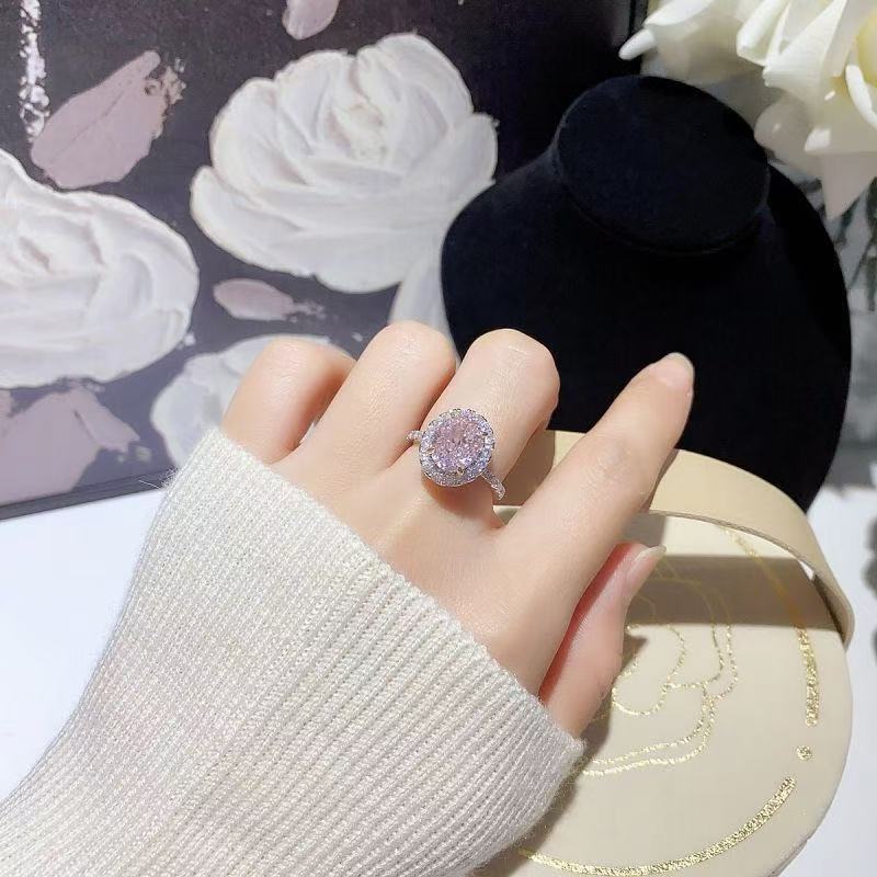 Pink diamond pigeon egg oval ring