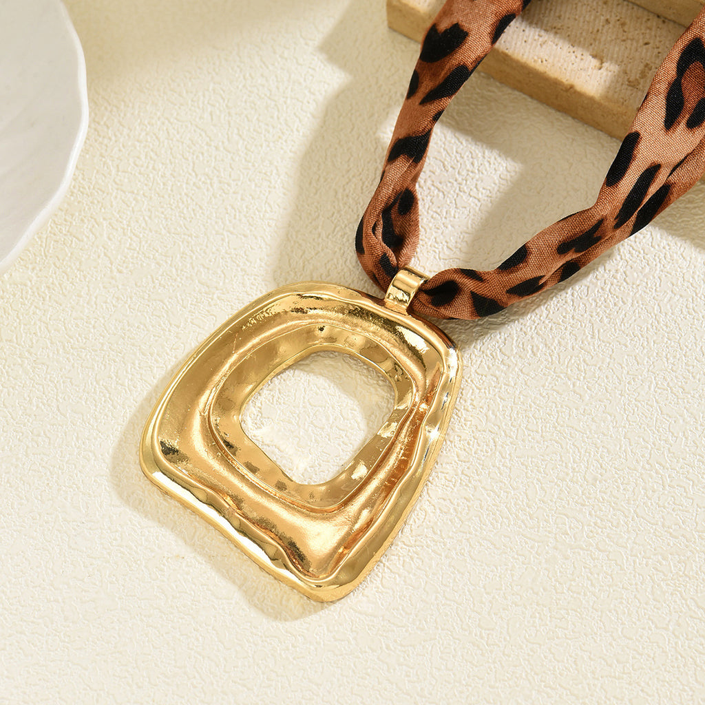 Leopard print ribbon necklace.