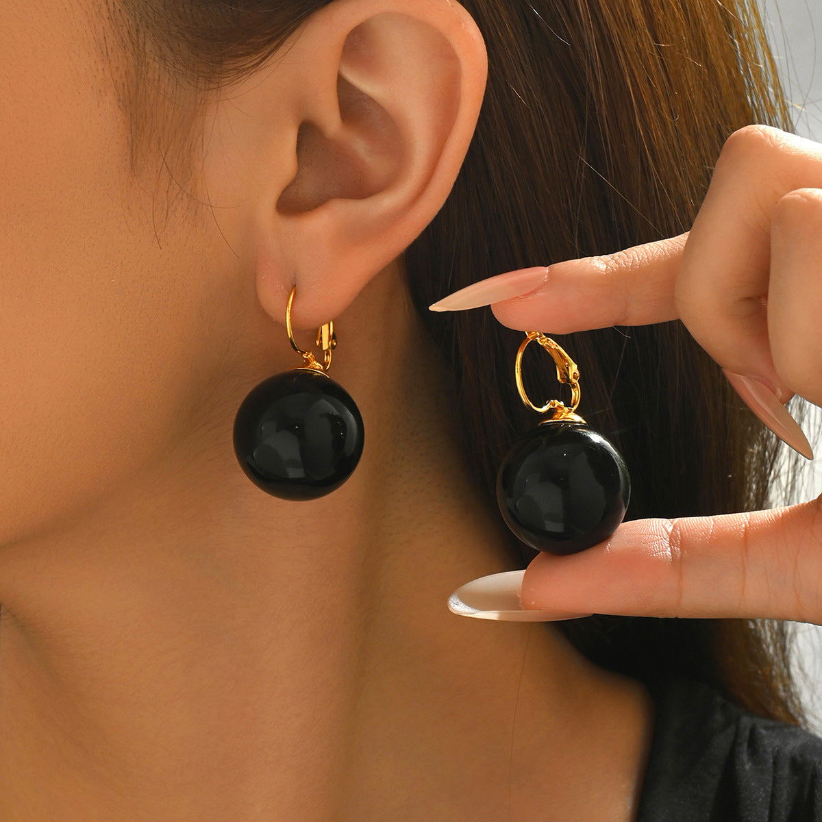 Simple pearl-set earrings