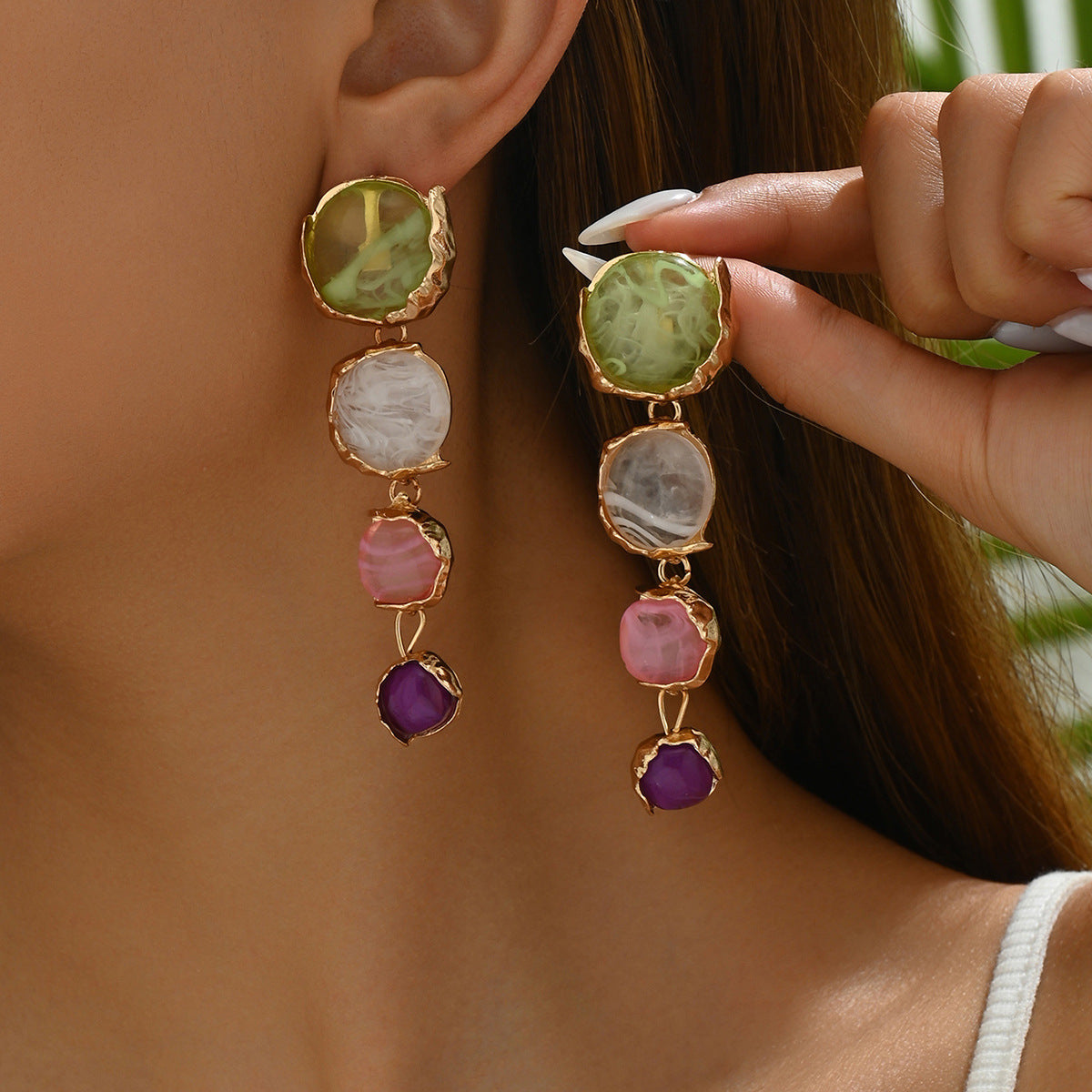 Forest-themed high-end earrings inlaid with gemstones