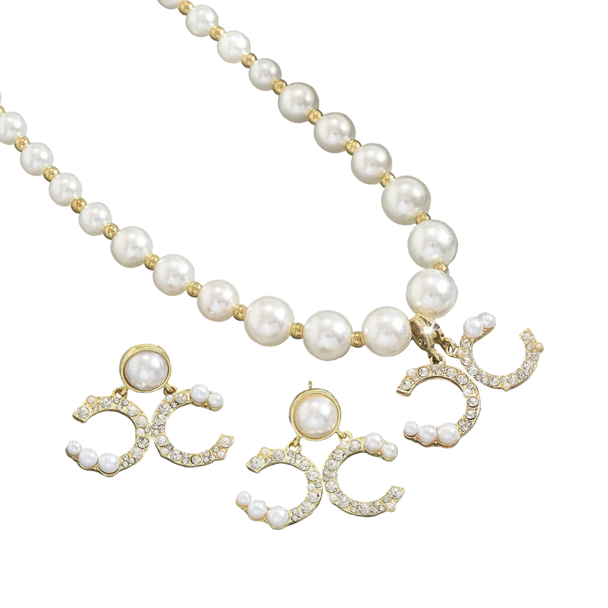 Diamond earrings paired with a long pearl necklace set