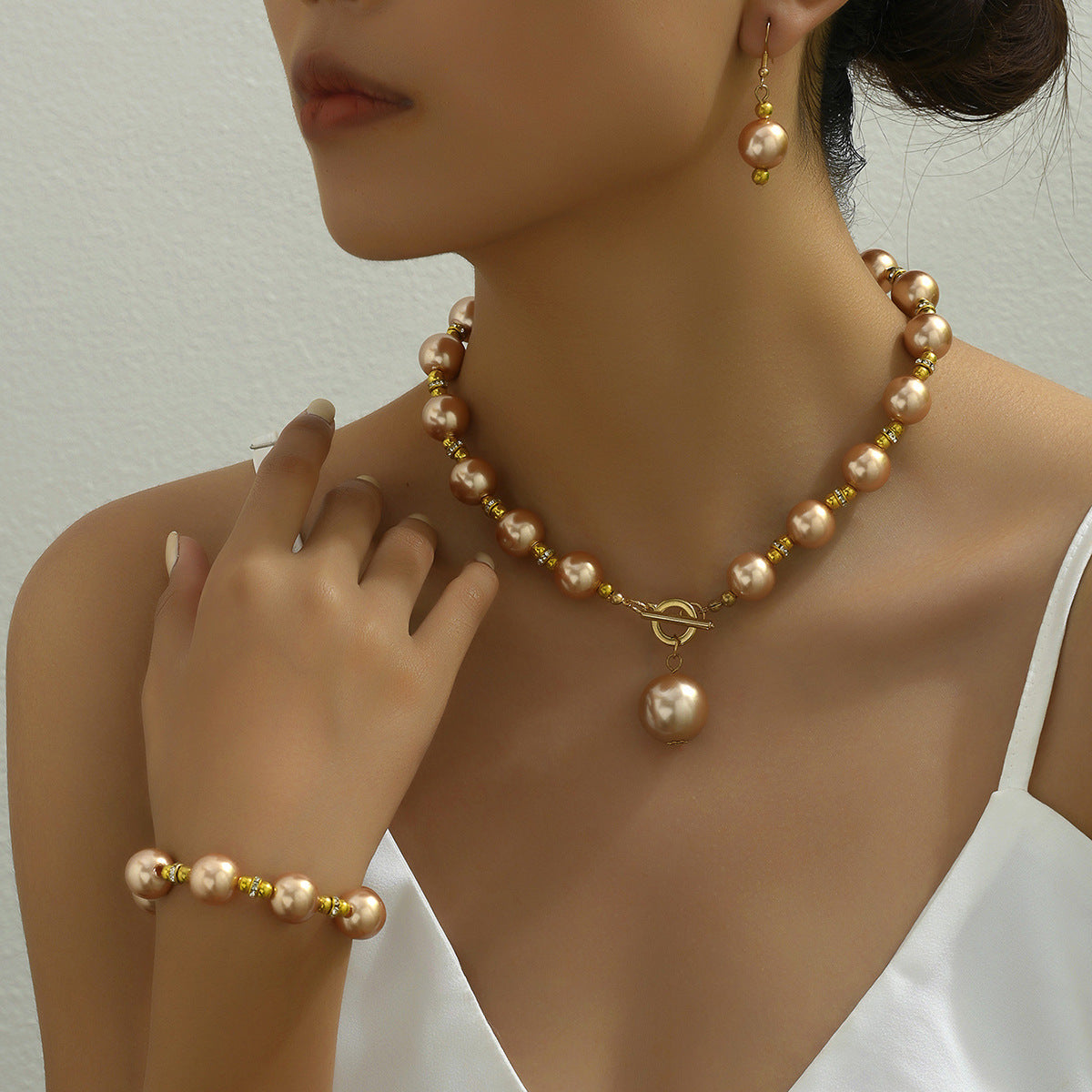 Vintage pearl necklace; elegant earrings; beaded bracelet set.