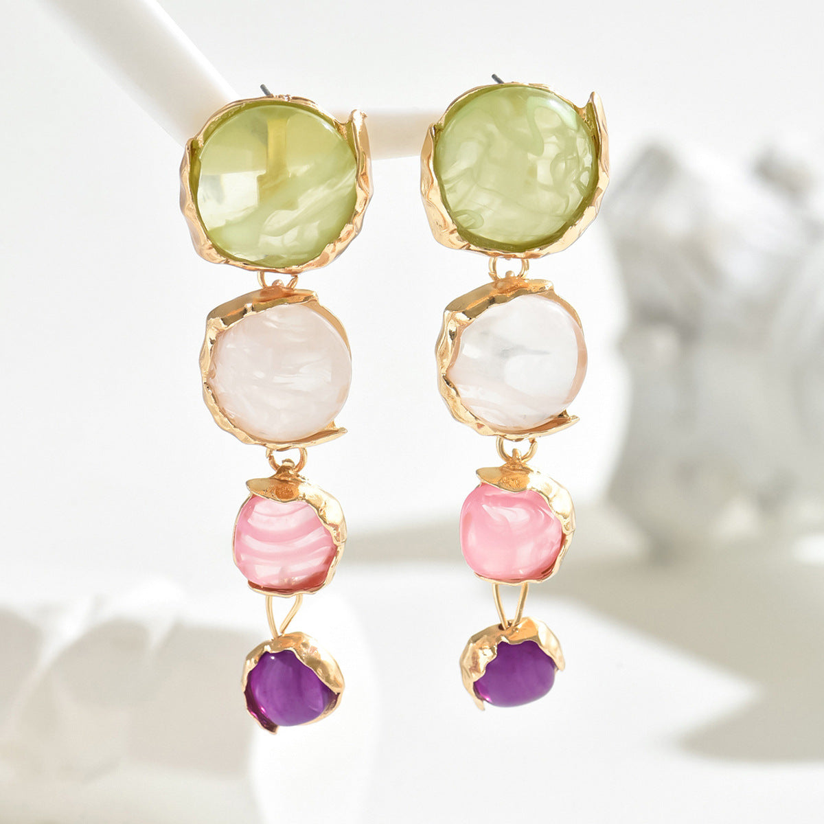Forest-themed high-end earrings inlaid with gemstones