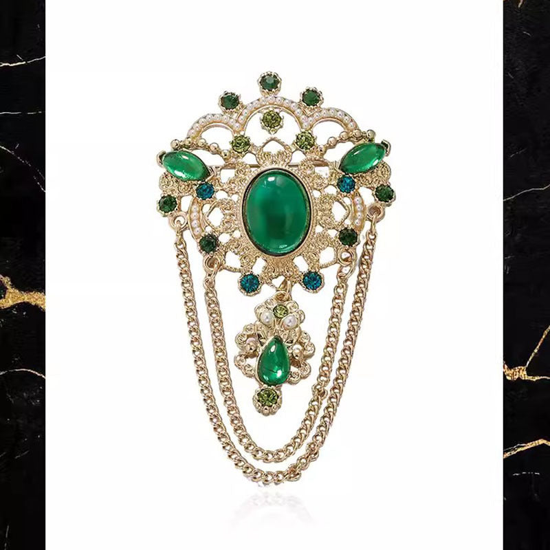 Broche de borla esmeralda