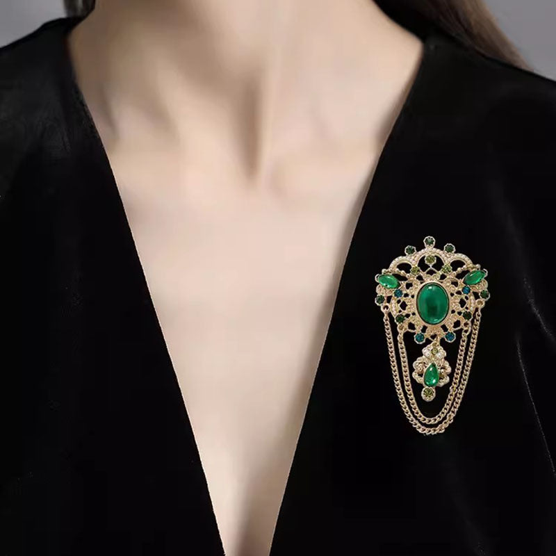 Broche de borla esmeralda