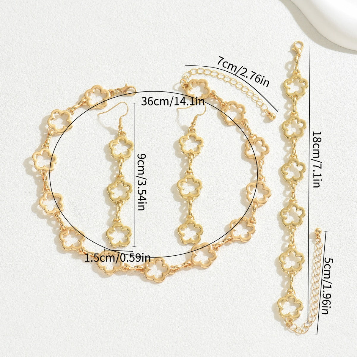 Plum blossom necklace, paired with tassel earrings and a bracelet set.