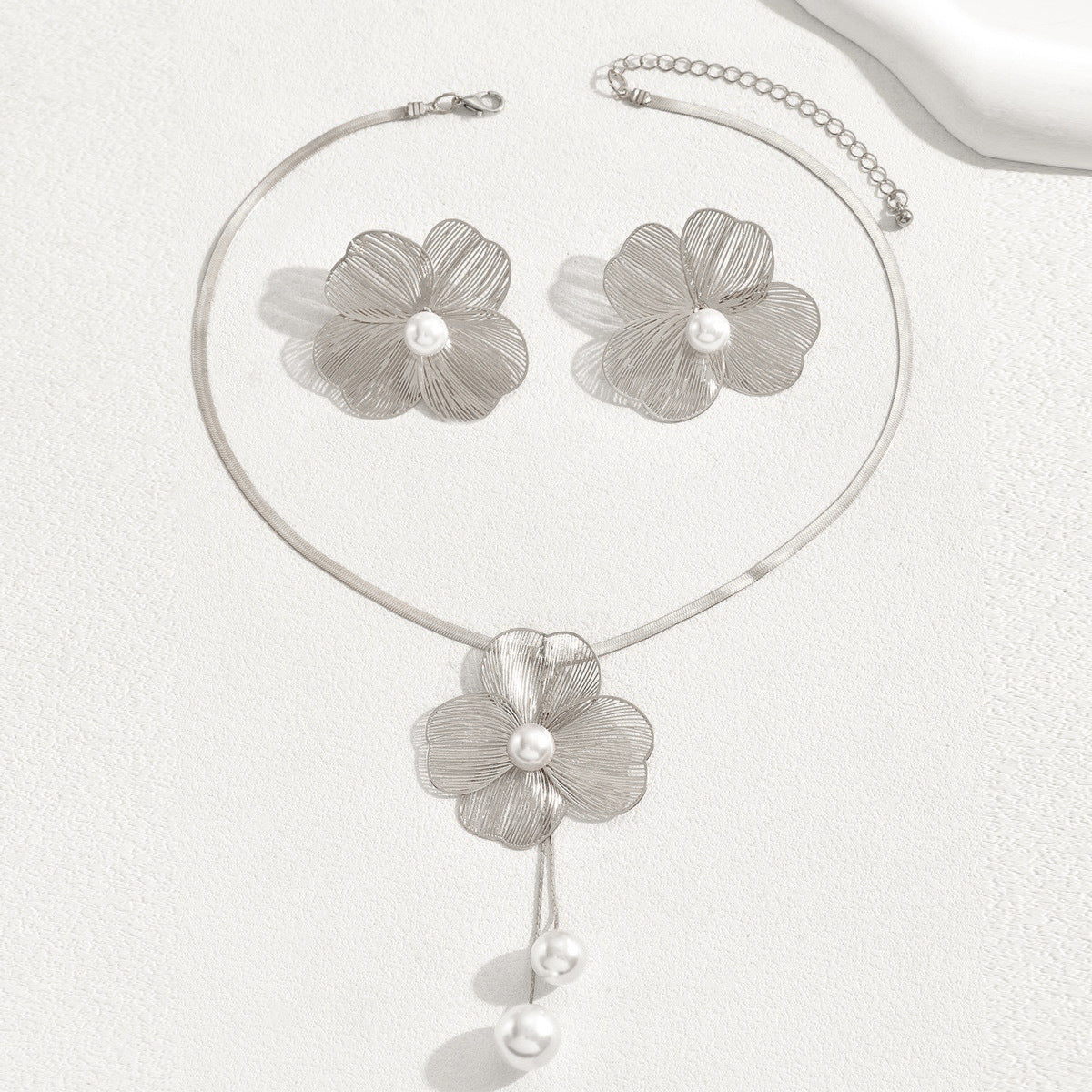 Flower and pearl necklace and earring set