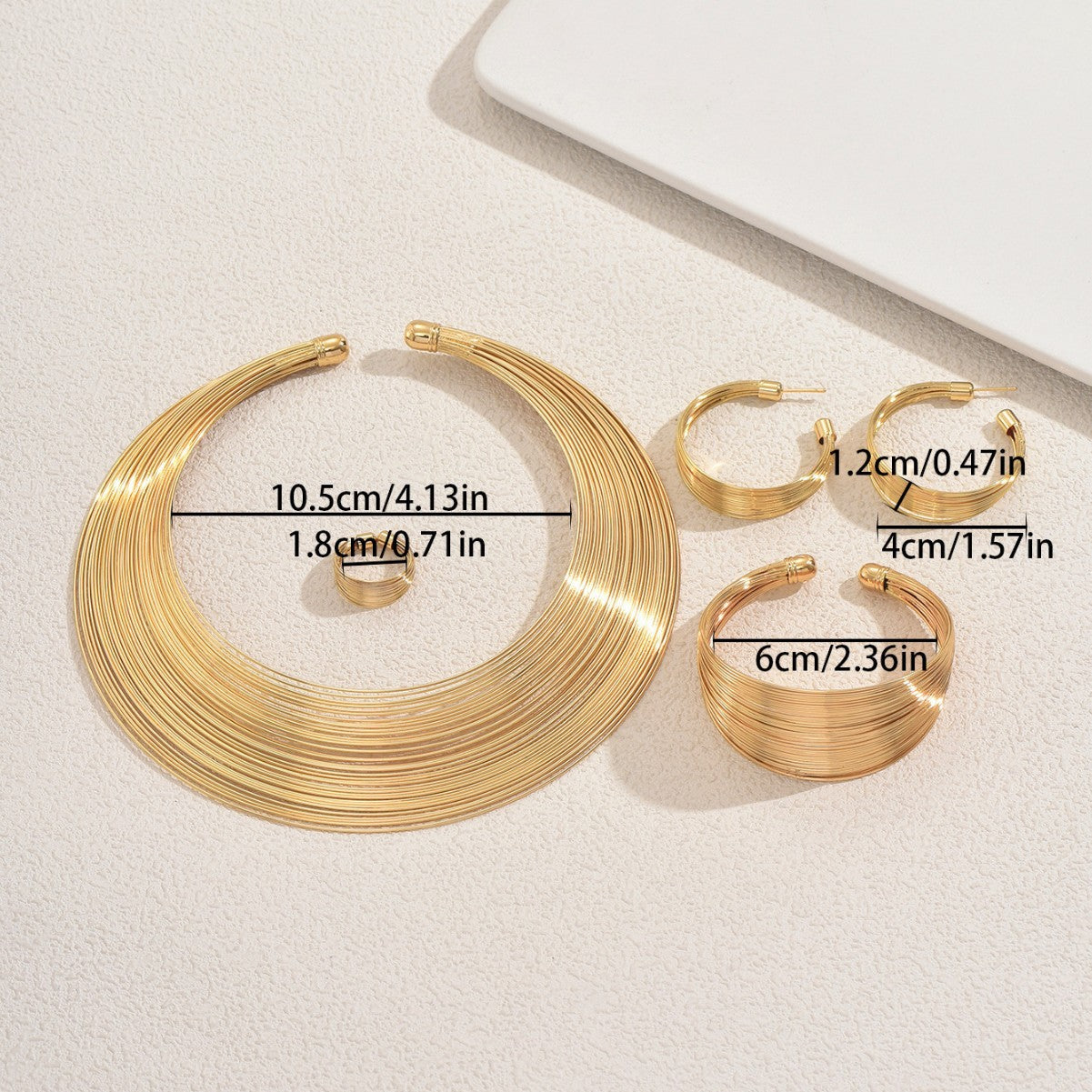 Multi-layered metal jewelry set, adjustable bracelet