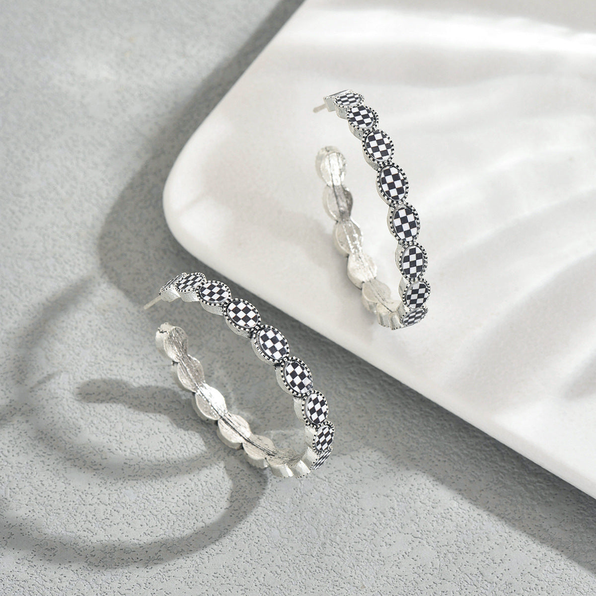 Vintage-style gemstone-encrusted C-shaped earrings