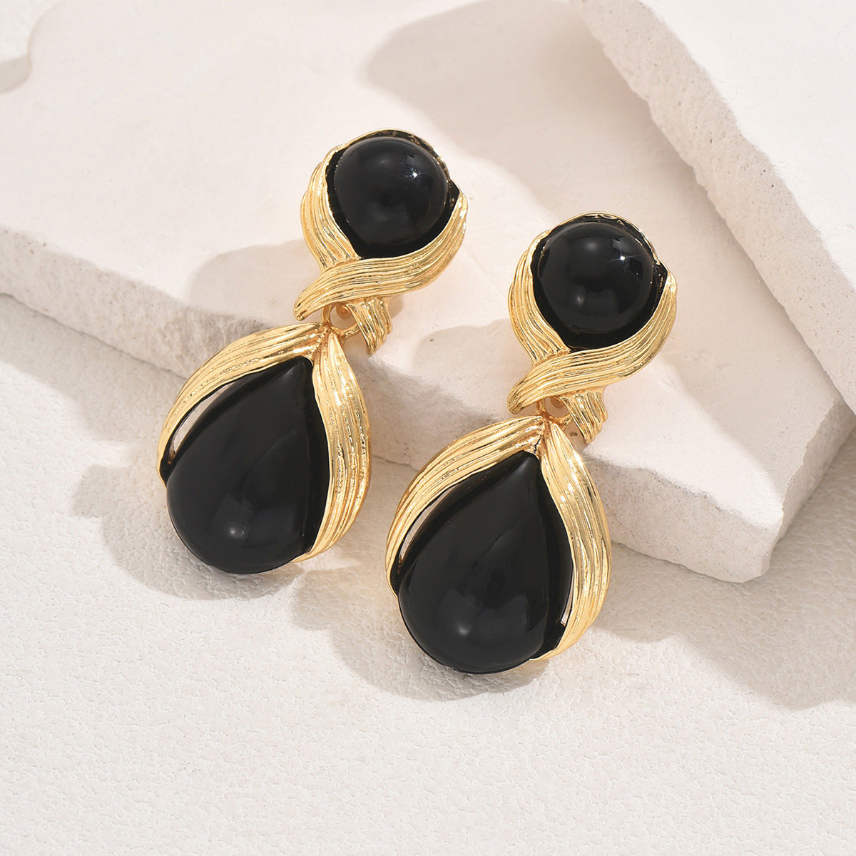 Small and delicate teardrop earrings